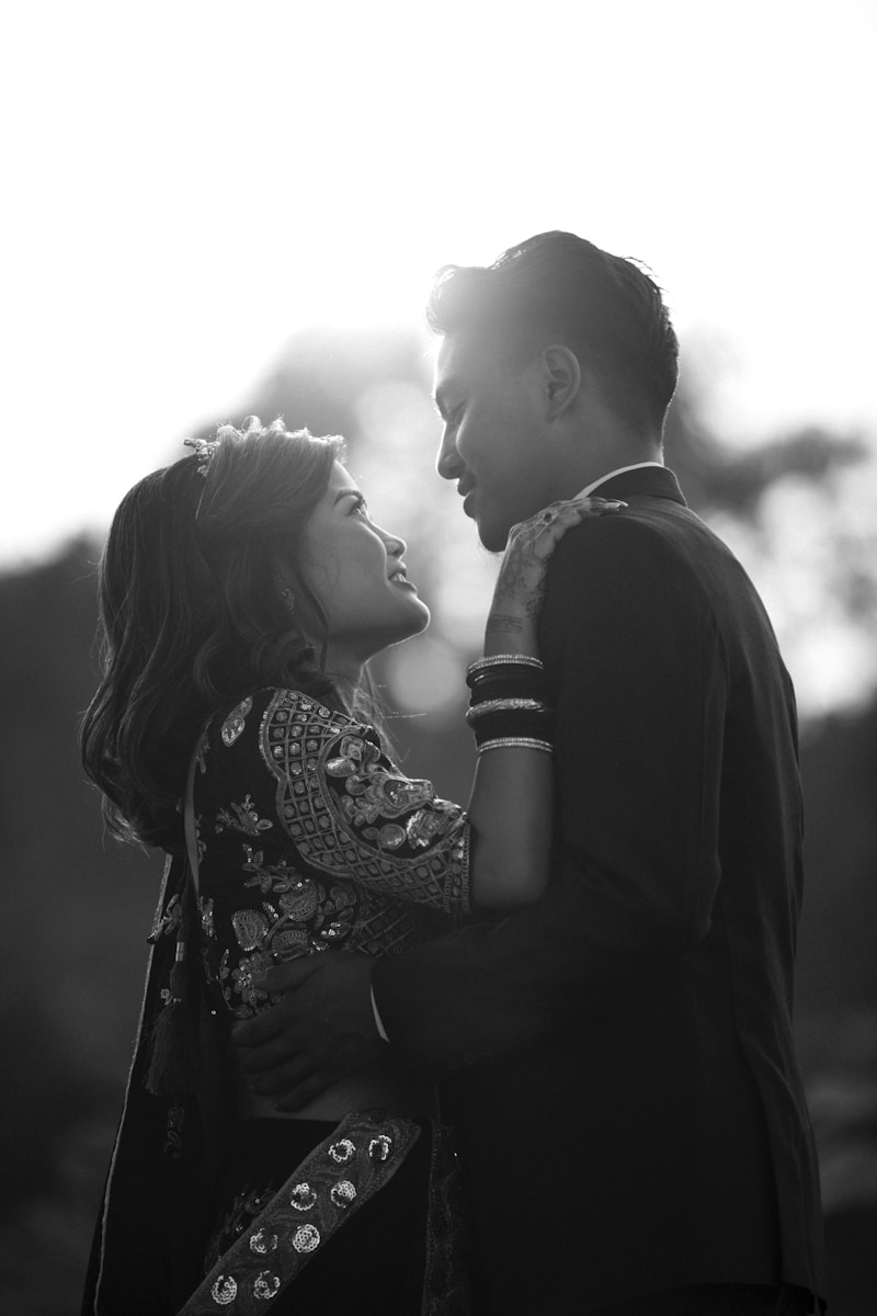 a man and a woman standing next to each other